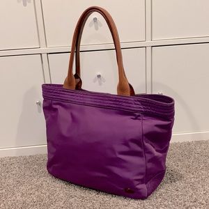 Dooney and Bourke Nylon Gwenny Tote with Leather Trim in the color Plum Wine